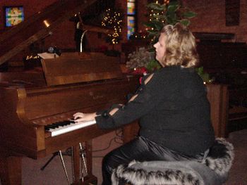 Holly playing "Winter Melody" an original piece created for this wedding
