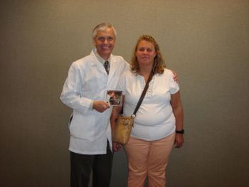 Dr. Lecy the proud owner of the CD, Holly from the Heart
