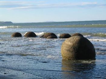 The Moeraki Boulders, New Zealand. Started as lime crystals 60 million years ago.
