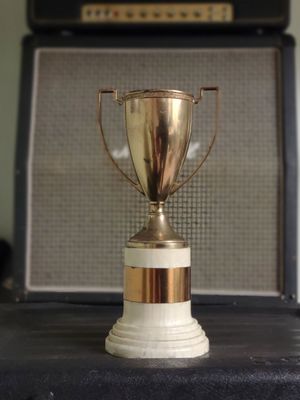 A trophy with a Marshall amp
