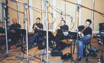 Lounging Saxophones L to R: Tom Christensen, Todd Bashore, Dave Pietro, Jason Rigby
