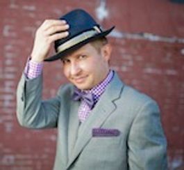 DJ Craig Henry w/ purple bow tie and tipped hat