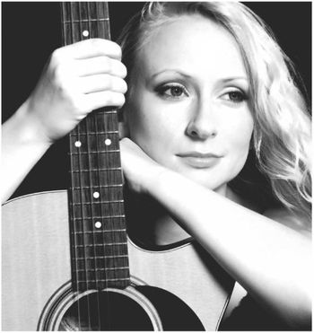 "Intuition" publicity shot with Maton guitar
