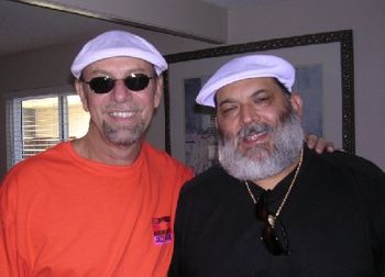 Cain with Latin music icon Poncho Sanchez
