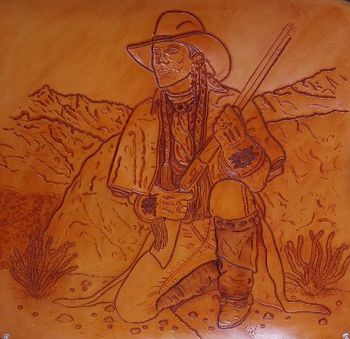 Pictorial Carving of Flint "The Arizona Wagon Burner"
