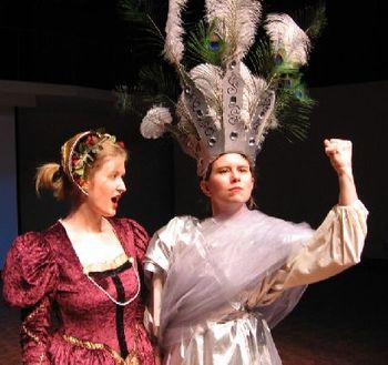 Masque 1 Eunomia gives 'em what for, while Irene sings. Fabulous hats made by Liz Ronan-Silva!
