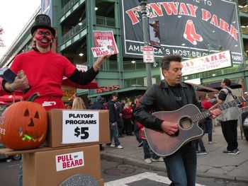 Just strummin' my guitar next to the weird Red Sox man.
