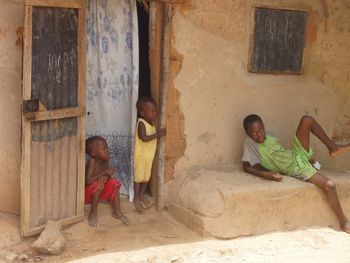 Three children in Mandinari, The Gambia
