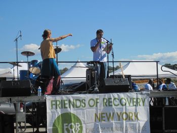 Kathy supporting a workshop participant at the 2013 NY Rally for Recovery
