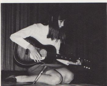 Loretta playing at talent show, 9th grade Archbishop Murray High School, 1969
