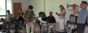 Derrik, Jared, Barry, Johnny, Miri, and Charlie Schneeweis playing at Shirley Jackson Day 2009
