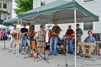 Hill Hollow at Mayfest 2012; Bennington, VT.  From left, Wayne, Marty, Terry, Nora, Chris, Jeff, Josh, and Barry.
