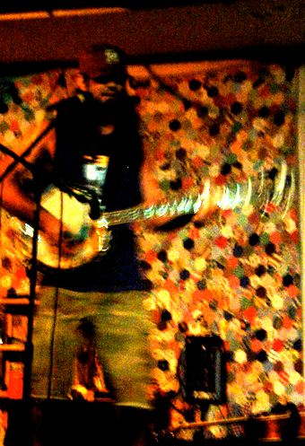 banjo blur at Super Happy Fun Land art gallery in Houston
