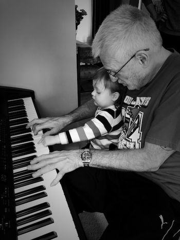 Playing "I Wish I Was The Moon Tonight" with granddaughter Jane
