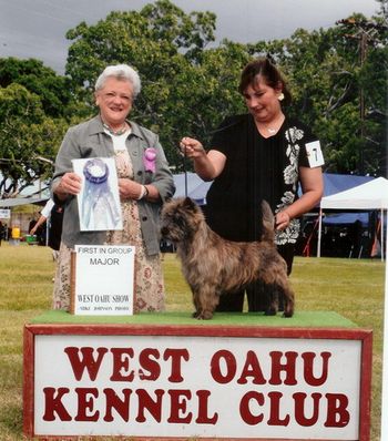 Tucker had a wonderful spring show season in 2009, starting with this unforgettable group win under breeder judge Lydia Hutchinson. Thank you Lydia! This win also resulted in a 5-point major (thank you Norwich Terriers!). Tucker finished at Orchid Isle Dog Fancier club with two more major wins. He is now Ch. Nakoa Tropical Scotch.
