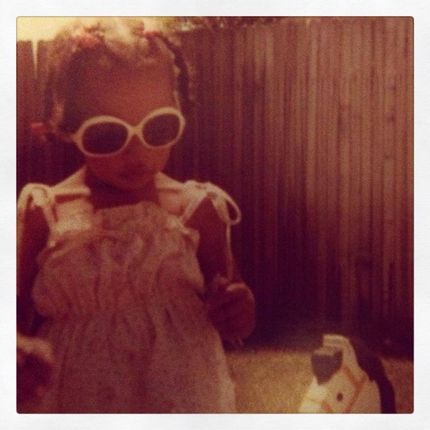 Baby Jamila With Sunglasses and toy horse