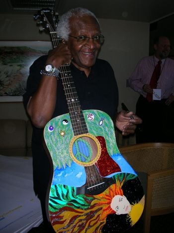 Bishop Tutu & the guitar that Beth Nielsen Chapman asked me to design for auction at Peace Jam.
