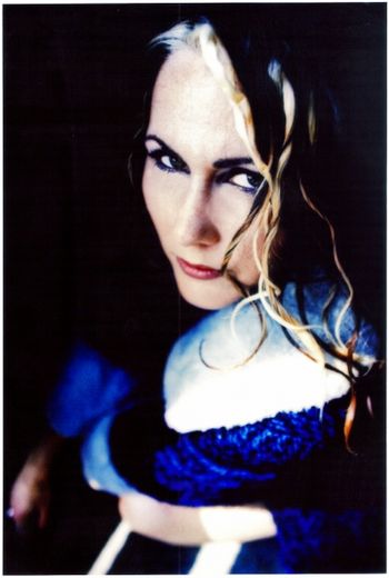 Viv in Blue Retro Coat photo shoot for Live Album 2000
