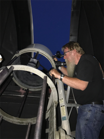 COORDINATOR JOHN BOLEN WITH LEWIS TELESCOPE
