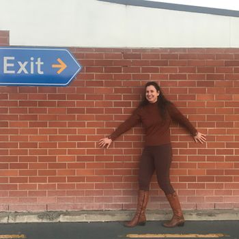 Hamming it up at the exit to the airport
