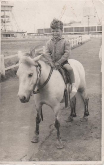 Young Robin on horseback
