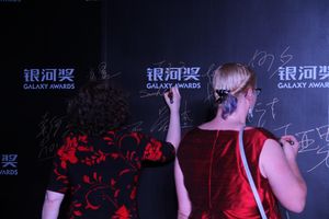 Crystal Huff and I sign the Galaxy Awards wall