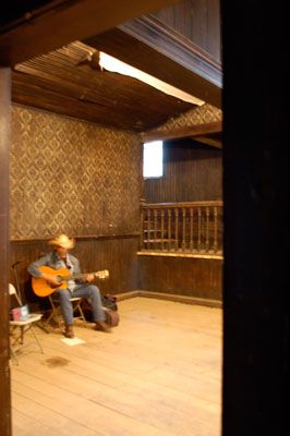 A singer singing to an empty hall
