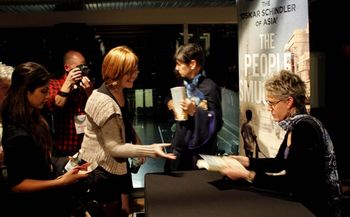 Robin signs books for fans at the Sydney Writers' Festival
