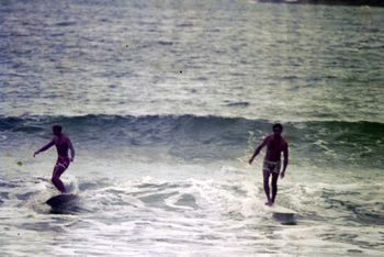 Ross and Tui sharing a wave at Oakura...summer of '65 Man these guys love sharing a wave together......must be a competitive thing..i mean look at the better wave behind them....Ha!
