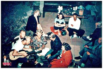 Surfer Tommy Zahn (guitar).....and Marilyn Monroe Tommy's girlfriend (black jacket)....beach party 1952
