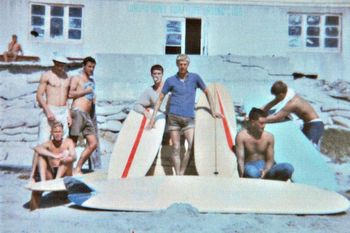 in front of the old Waipu Cove surfclub ...1963 Ross...?....Kit Steer....Roddy....Max....Tui...?..........some saturday nights you would walk into that clubhouse and there would be 20 or 30 people asleep on the floor in their sleeping bags...Ha!!
