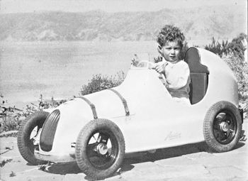 'Mr Curls' Rod Haywood in his cool looking pedal car ...1953 ...you may have had a peddle car too...very cool days!!...
