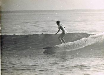 Auckland boy Mark Wheeler at Pakiri....summer of '68 Mark on one of those thin-railed ...greenough fin (cutting edge) Peter Way boards....massive board changes taking place!!

