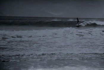 Well Trevor King decided to go out for a surf.... cold wet day...cross wind..lumpy surf....rather just listen to Dylan.....Trev at Waipu.............do you remember those sort of days!!!
