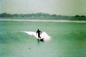 Tim on a wilder day at 'shipwrecks'....1967 Having a little play on that high tide right....
