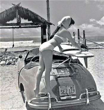 Miss Shari Clark. and her 356 Porsche Speedster.....LA around 1964
