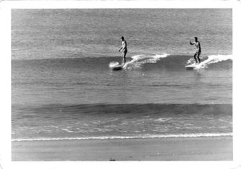 Mike Cooney & Tui Wordley on that nice little high tide peak...Pataua summer of '64 Tui had the Hawaiian flowery boardshorts thing happening by then!...it also amazes me that we could catch a wave so easily then...i mean Tui's already walking & the wave is no where near breaking yet!!.
