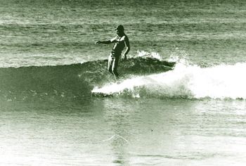 Mike Cooney ..Pataua...winter of '65 By 1965 we had these short sleeved vests, which made winter surfing so much more enjoyable!!
