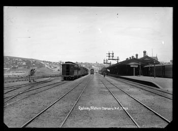1920 Looking along Oamaru Railway Station, with township of Oamaru behind

