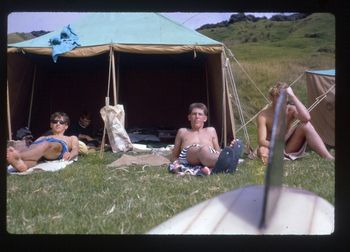 Laurie in blue trunks...Paddy kelly in the tent..and Murray Jacks (unknown behind fin)...man these guys were organized....Aussie guys, Johnny Ayton and myself camped for 6 weeks at Ahipara in '68..no tent....oh boy!!!!...but boy did we have some awesome waves!!
