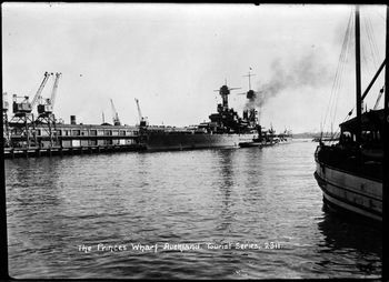 1925 Showing a battleship berthed alongside Princes Wharf, Auckland.  it may in fact be the USS Tennessee or the USS California
