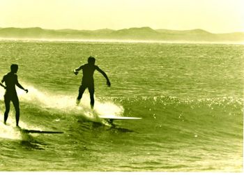 and of course....shippies can get pretty nice in the summer too!! Trev King taking a photo of some of the 'shippy rippers' ....summer of '67
