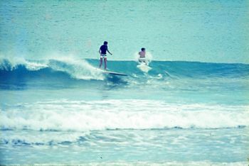 Ian Butt & Murray Jacks having a nice saturday morning session at Waipu...summer of '65 How inviting does that look!!!!..
