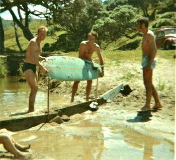 south end of Langs ...summer of '65.. The boys havin' fun.....Ross ..Barry Chappell...and Phil Mischesky building a dam at the little river that runs out at south Langs....remember doing that myself many times...did you!!!
