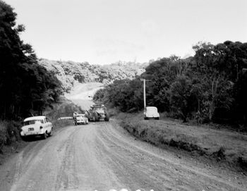 like the Piha road here...in 1963... finally getting some attention.....imagine going down those steep bends a few years earlier on a wet day!!!!....ah!..such were the pioneering days of finding new surf spots...awesome!!!
