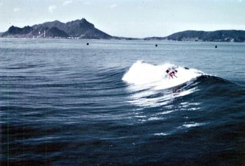 Mike Cooney summer of '66 Telephoto shot taken from the pier...about 150m out to sea on the beautiful north peak...you can see the deep water channel on this side!! The south peak left peeled off straight under the pier!! awesome fun..
