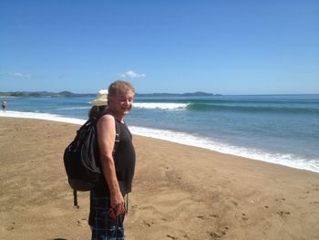 60 yr old Graeme Kelly 'Fry' Graeme & his wife on Pataua Bch on a beautiful 2013 summer morning..warm water..good swell..Graeme has been living at Pataua for years..he just couldnt look at that perfect left this day..left his board at home.(or did he forget it!!!)..dosen't surf now
