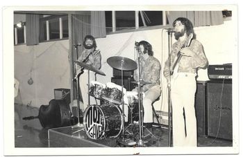 Mojo Gave....1971 gone were the days where we would name bands..."The Clive Brown Trio".......its some exotic weird name nowdays...Ha!!!...matched our hippie long hair...
