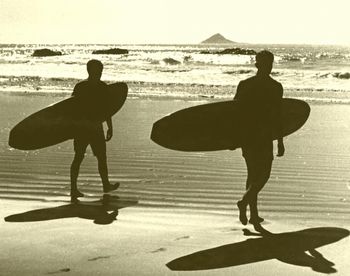 and here's another of the Bob Davie crew...Terry 'Fang' Fitzgibbon.. Former Oamaru boy Terry and his mate going for a surf back there in the summer of '67....awesome!!
