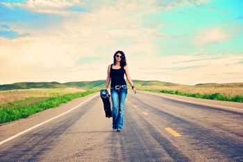 Jessie Veeder walks a quiet highway near her home
